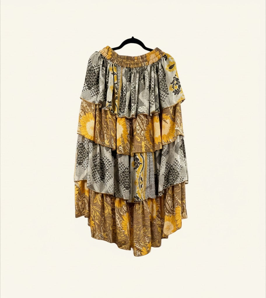 She Lives Beauty Ruffle Muse hi-lo skirt in vintage yellow and grey patterned rasgulla silk with cascading ruffles.