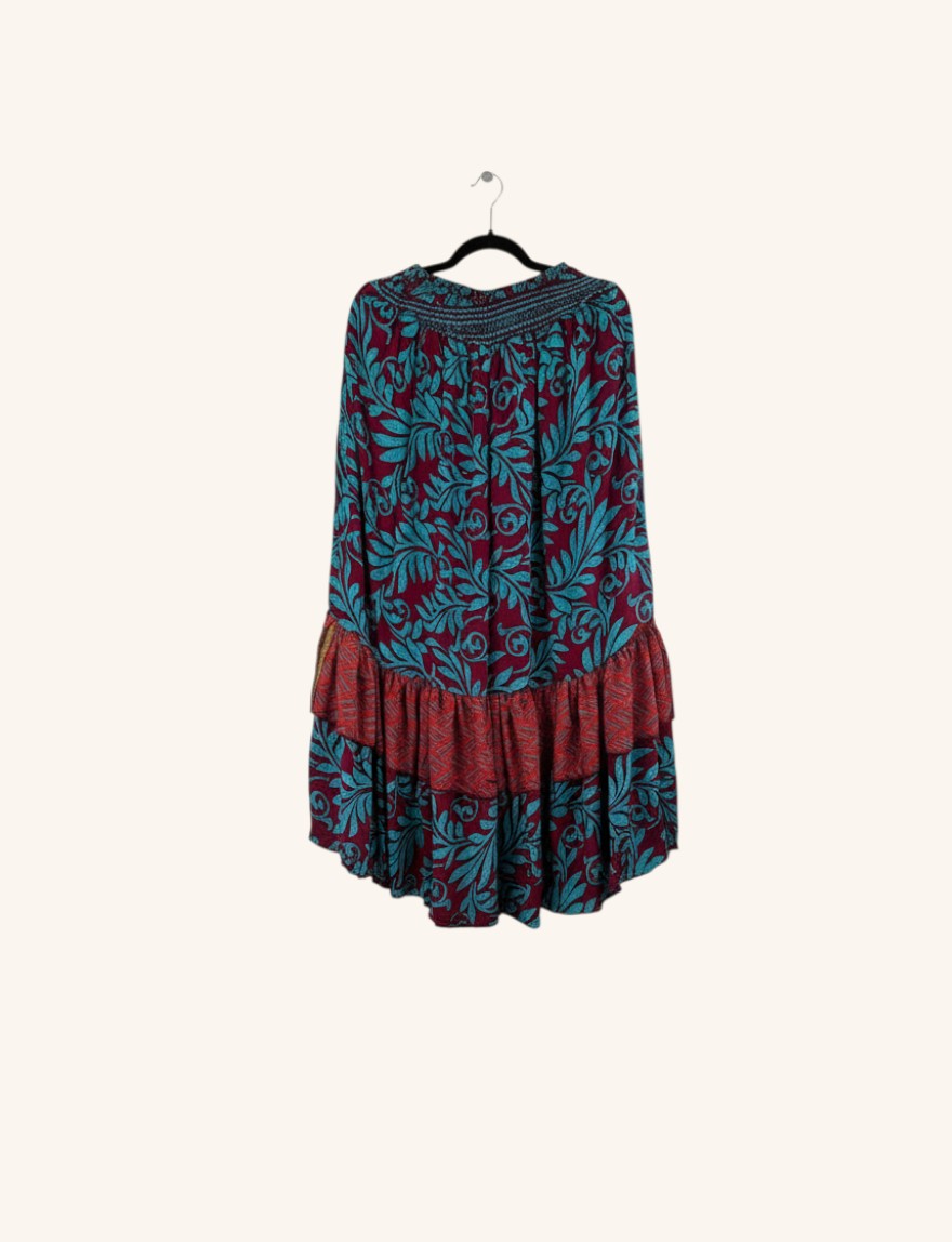 She Lives Beauty Gypsy Moon silk ruffle pants in burgundy and teal floral print with a relaxed bohemian silhouette.