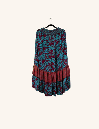 She Lives Beauty Gypsy Moon silk ruffle pants in burgundy and teal floral print with a relaxed bohemian silhouette.