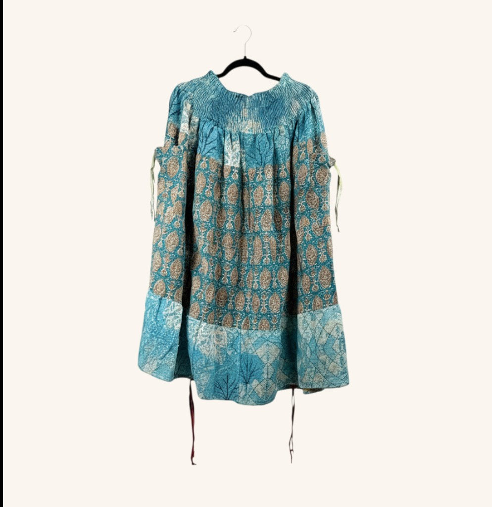 She Lives Beauty Earthbound midi skirt in blue vintage kantha cotton with adjustable side cinches and floral print.