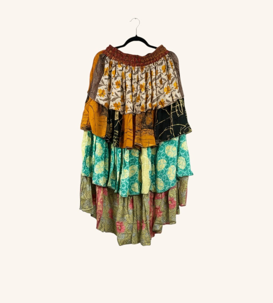 She Lives Beauty Ruffle Muse hi-lo skirt made from vintage multicolored Rasgulla silk with a tiered ruffled hem.