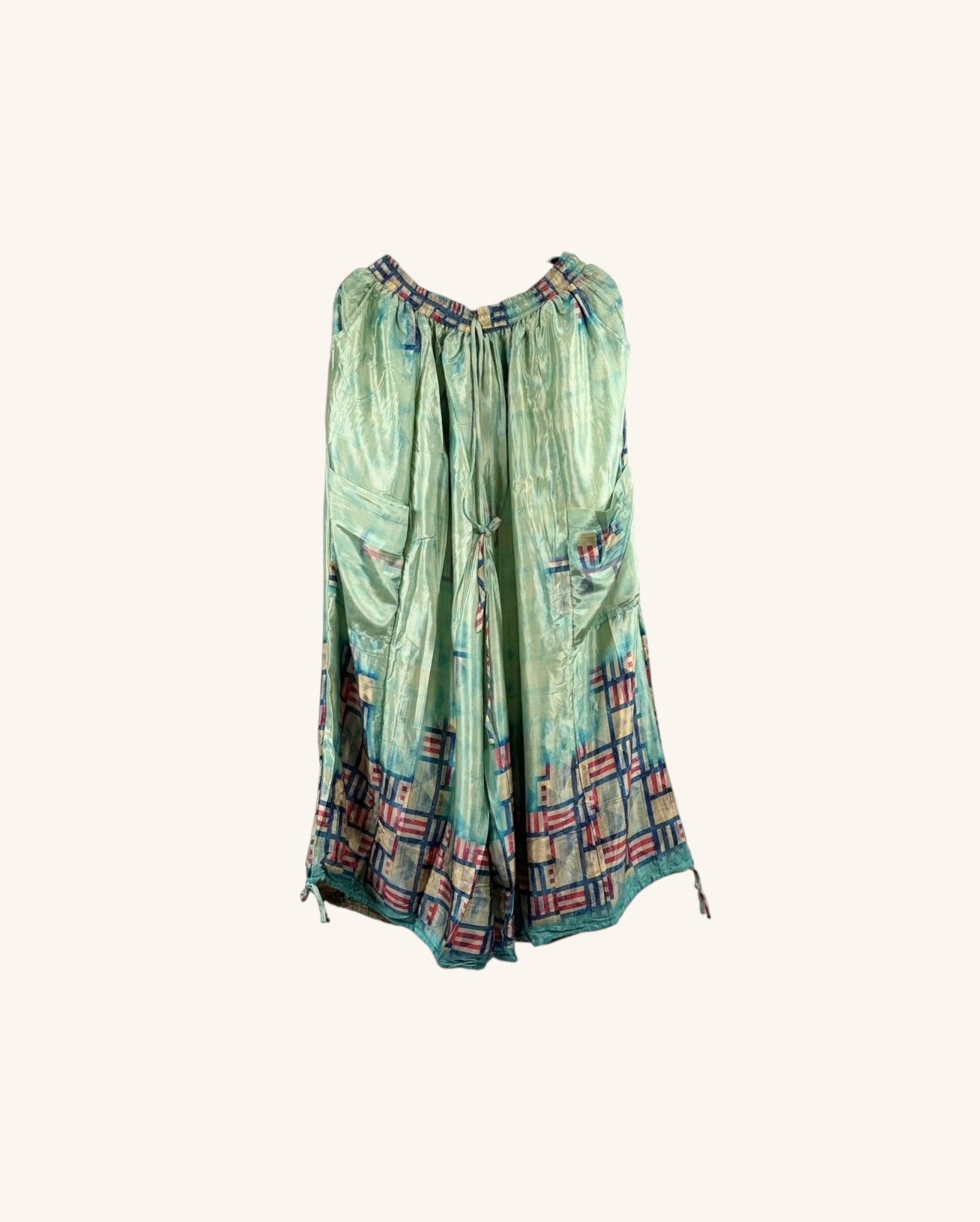 She Lives Beauty vintage rasgulla silk wide leg jogger pants in light green with a patchwork hem pattern.