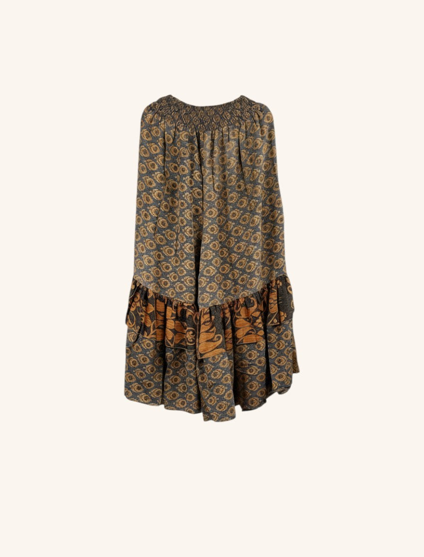 She Lives Beauty Gypsy Moon vintage rasgulla silk pants with a bohemian floral print and double ruffle hem detail.