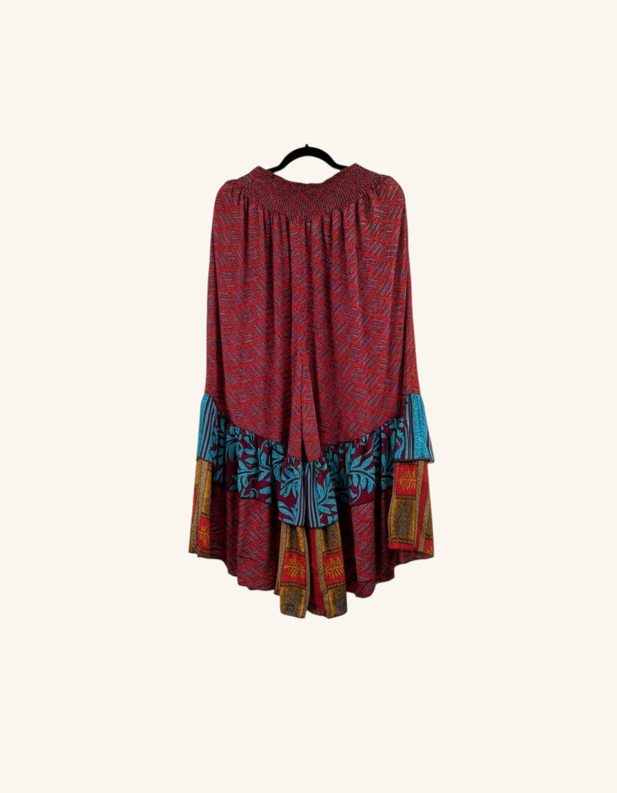 She Lives Beauty Gypsy Moon vintage rasgulla silk pants featuring a red patterned fabric and double ruffle hem.