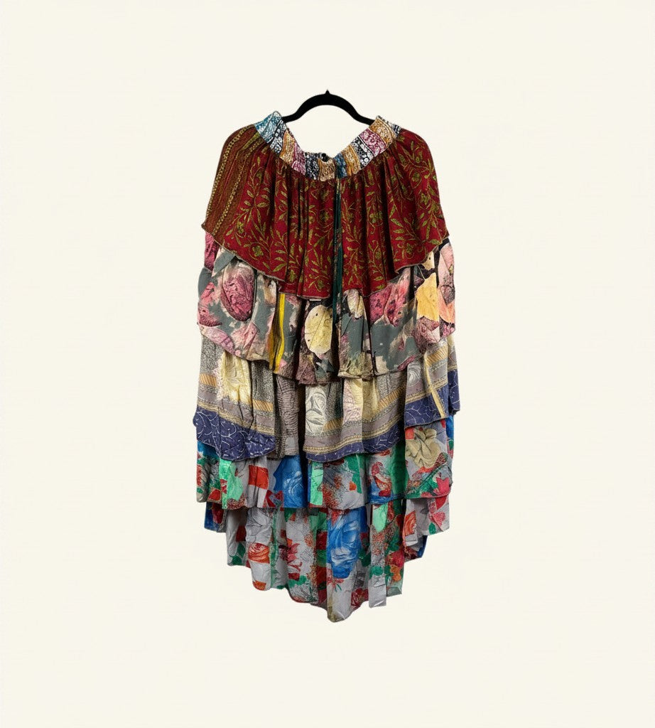 She Lives Beauty Ruffle Muse hi-lo skirt made from vintage multi-colored floral rasgulla silk with cascading ruffles.