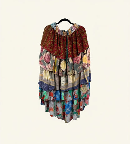 She Lives Beauty Ruffle Muse hi-lo skirt made from vintage multi-colored floral rasgulla silk with cascading ruffles.