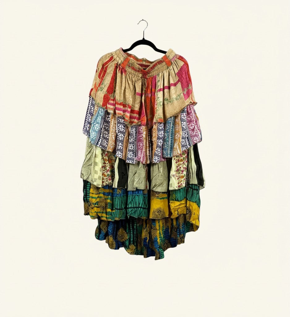 She Lives Beauty Ruffle Muse hi-lo skirt made from colorful vintage Rasgulla silk saris with cascading ruffle tiers.