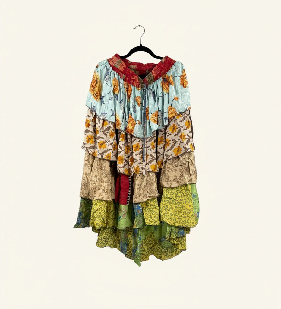 She Lives Beauty Ruffle Muse hi-lo skirt made from vintage multicolored floral Rasgulla silk with cascading ruffles.