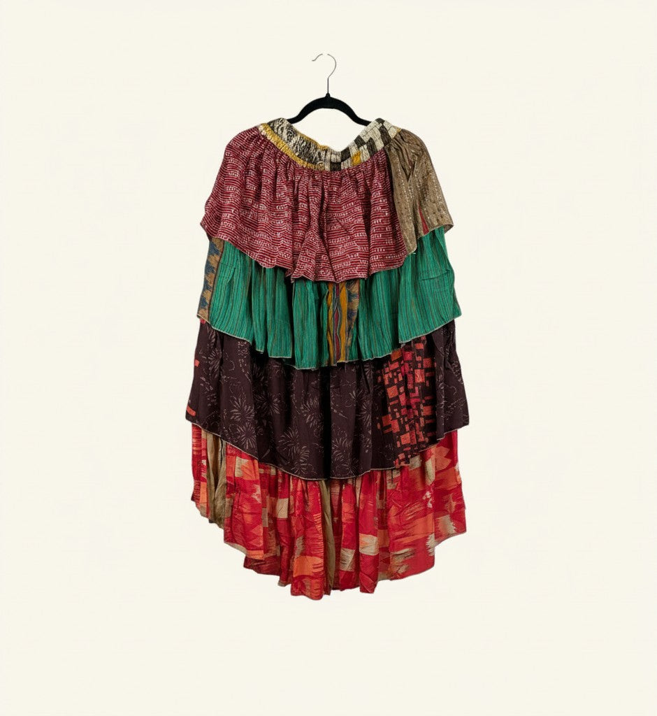 She Lives Beauty Ruffle Muse hi-lo skirt in multicolored vintage Rasgulla silk with cascading ruffled tiers.