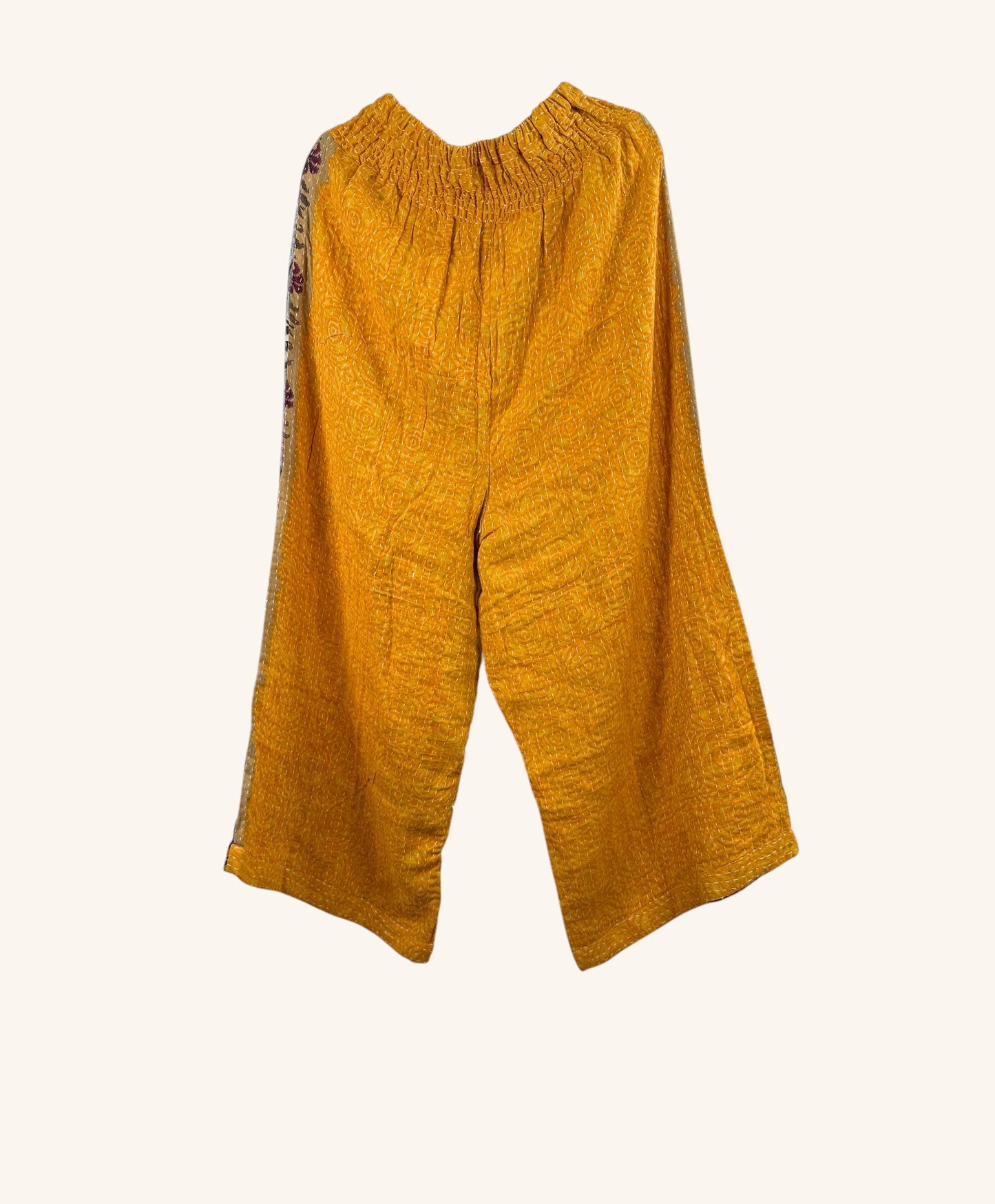 She Lives Beauty yellow wide leg Kantha pants made from vintage cotton with hand-stitched details and elastic waist.