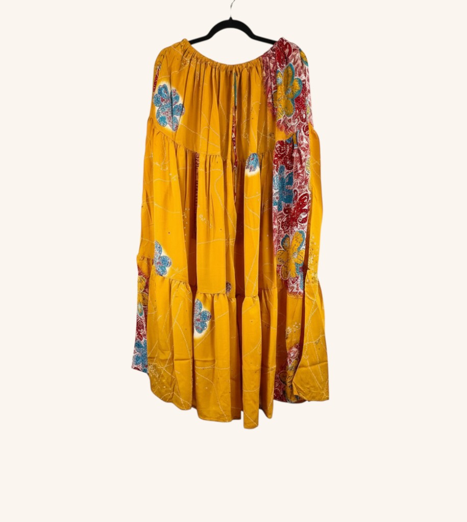 She Lives Beauty Prairie Soul maxi skirt in yellow vintage Rasgulla silk with kantha stitching and floral patterns.