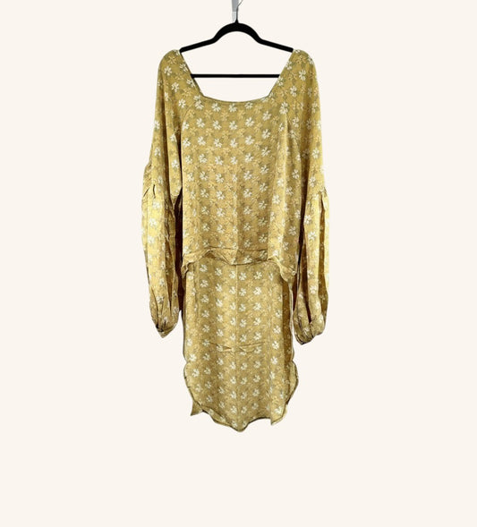 She Lives Beauty Desert Rain silk top in yellow with white floral print, featuring ruffle sleeves and hi-low hem.